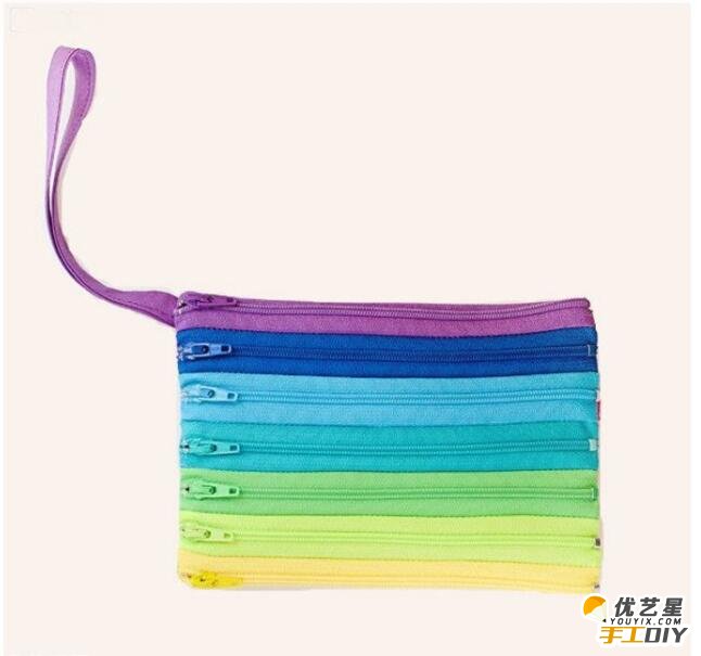 用各种颜色的拉链手工制作而成的精美漂亮创意个性手提包 创意手提包的手工制作步骤教程_www.youyix.com