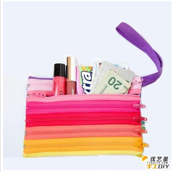 用各种颜色的拉链手工制作而成的精美漂亮创意个性手提包 创意手提包的手工制作步骤教程_www.youyix.com